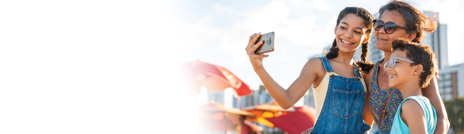 Family taking a selfie at a beach