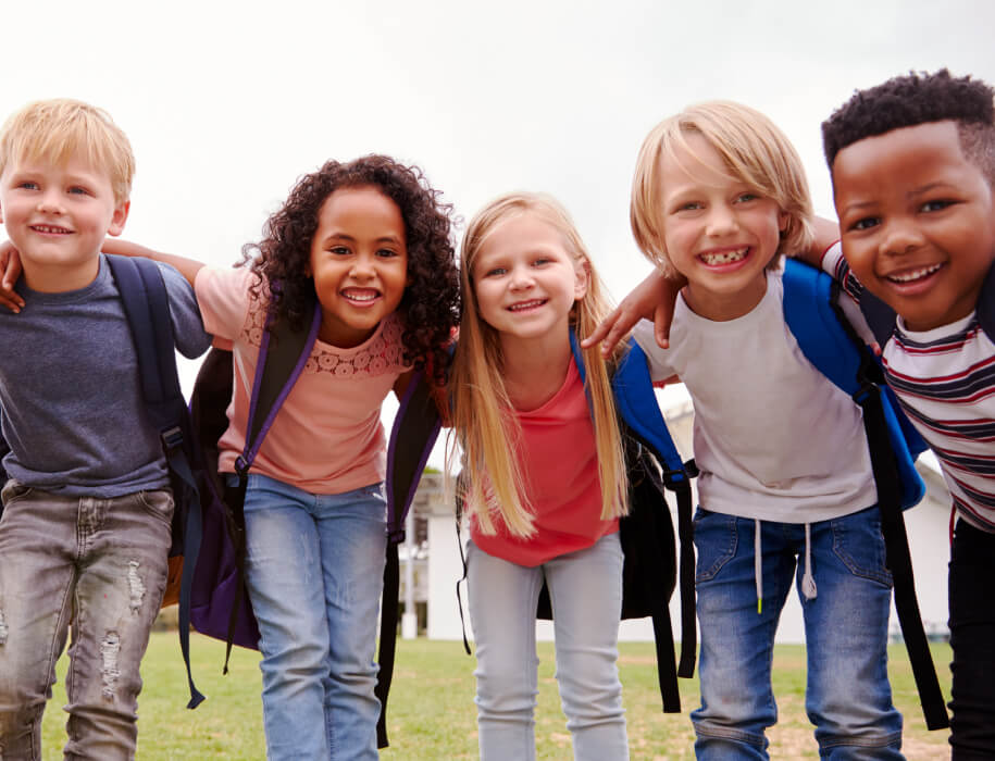 group of young kids circling the camera